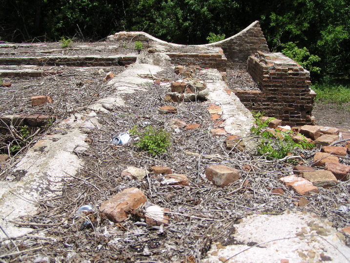 Brick foundation to support steam boiler and firebox.
